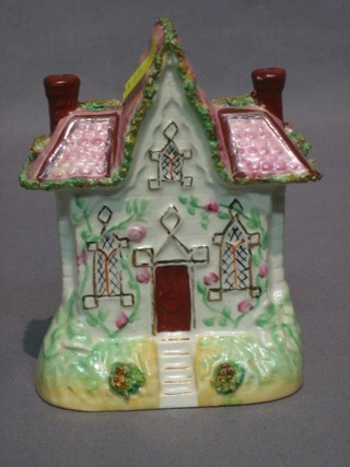 A 19th Century Staffordshire pastel burner in the form of a cottage 5"