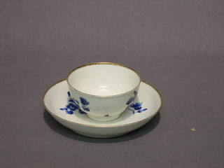An 18th Century "Worcester" blue and white porcelain teabowl and saucer