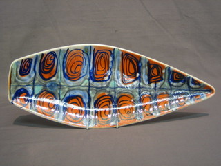 A 1960's Poole Pottery Atomic orange leaf shaped dish, the base marked 28, 17"