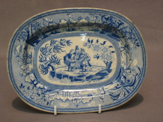 A Victorian miniature blue and white pottery meat plate decorated 3 musicians 8"