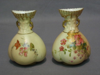 A pair of Royal Worcester twin handled, club shaped blush ivory vases, the base with green Worcester mark and 11 dots. RD no. 167140  1663, 4"