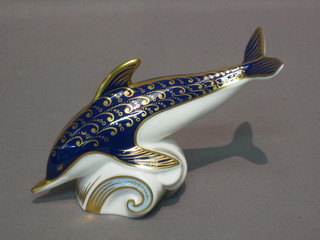 A modern Royal Crown Derby figure of a diving dolphin 7"