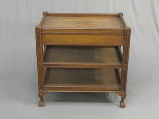 A 1920's Chippendale style mahogany 3 tier tea trolley, raised on cabriole claw and ball supports 29"