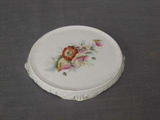 A Victorian porcelain teapot stand with floral decoration 7"