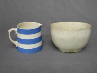 An oval white glazed jelly mould 7" and a T G Green & Co blue and white jug, base with cathedral mark 4 1/2"
