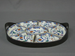 A Booths oval pottery hors d'eouvres dish contained in a twin handled mahogany tray 16"