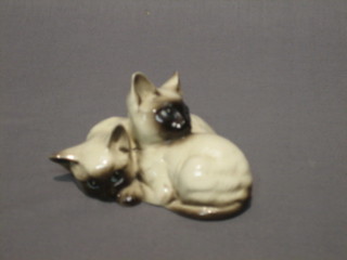 A Beswick figure of 2 seated Siamese cats, the base marked Beswick 1296 4"