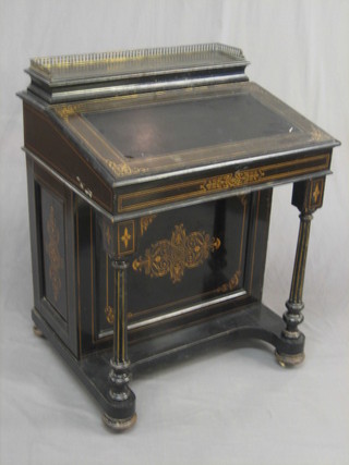A late Victorian ebonised Davenport with stationery box and pierced brass gallery, the pedestal fitted 4 drawers, raised on turned supports 27"