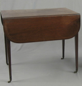 A Georgian  mahogany oval drop flap Pembroke table inlaid satinwood stringing, raised on square tapering supports ending in brass caps and castors 33"