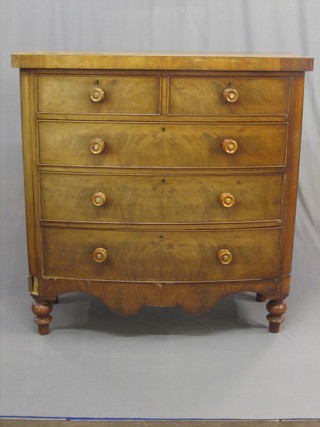 A Victorian mahogany D shaped chest of 2 short and 3 long drawers, raised on turned feet 46"