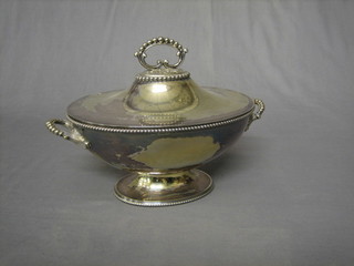 An oval silver plated sauce tureen and cover by Mappin & Webb with bead work border
