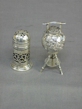 A miniature Oriental silver kettle on stand and a silver cased pepperette with blue glass liner