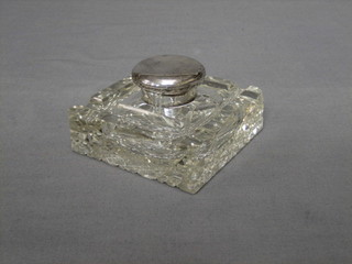 A square silver and cut glass inkwell, London 1927 4" (slight chip to corner)