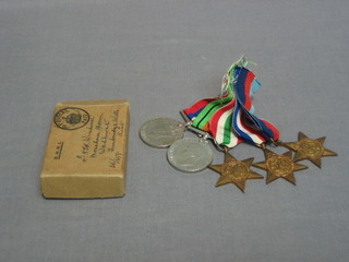 A group of 5 medals comprising 1939-45 Star, France and Germany Star, Italy Star, Defence and War medal together with original cardboard carton