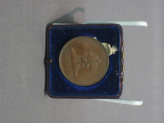 A bronze medallion made of copper from Lord Nelson's flag ship Foudroyant