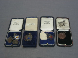 7 various cycling medals and a bronze ditto