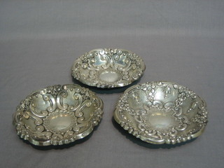 3 circular embossed Continental silver dishes 4 1/2"