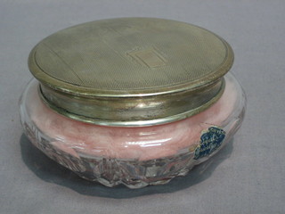 A circular cut glass powder bowl with silver lid and engine turned decoration, Birmingham 1921