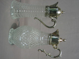 A modern moulded glass claret jug with silver plated lid and 1 other