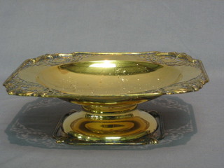 A square pierced silver gilt pedestal fruit bowl, Sheffield 1947 by Walker & Hall, 15 ozs