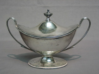 An oval Georgian style twin handled silver plated sauce tureen