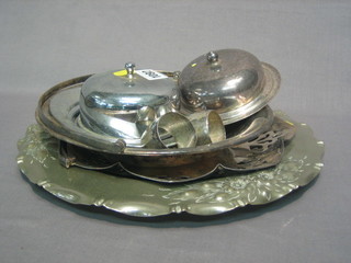 A silver plated butter dish and cover, a chromium plated do. 2 cake baskets with swing handles and a small collection of plate