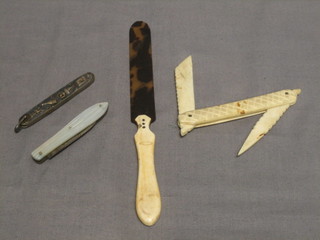 A tortoiseshell and ivory bladed paper knife 8", an ivory folding double bladed knife, a silver bladed folding fruit knife with mother of pearl grip and 1 other (f)