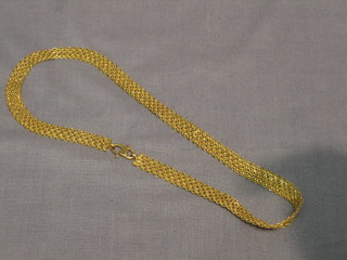 A gold flat link necklace