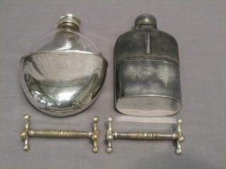 2 hip flasks with silver plated cups together with a pair of silver plated knife rests