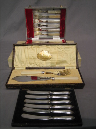 A set of 6 stag knives with stag horn handles, a pair of silver plated fisher servers, a set of 6 fish knives and forks and a set of 6 silver handled tea knives, all cased