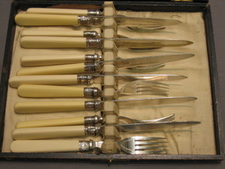 A set of 6 silver plated fish knives and forks