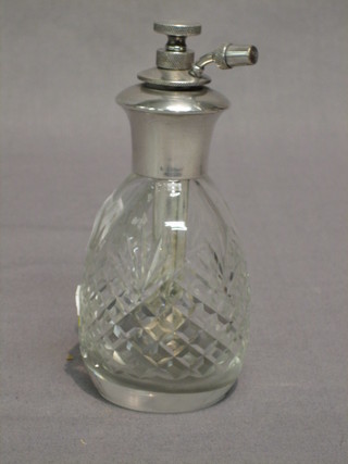 A cut glass perfume atomiser with silver collar, London 1925, 4"