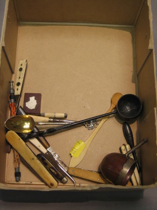 A 19th Century walnut and silver mounted ladle bowl, a Continental silver tea spoon, various curios etc