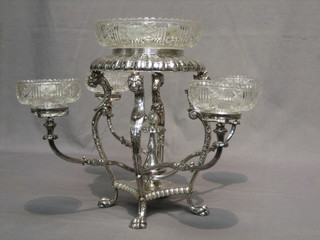 A handsome Edwardian silver plated and Irish cut glass table centre piece with cut glass bowl to the centre (cracked) surrounded by 4 outswept branches with 4 smaller cut glass bowls, raised on hoof supports