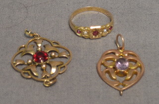 2 gold pendants and a lady's dress ring set "rubies" and pearls