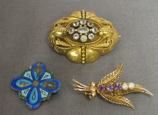 A pinch beck brooch set white stones, a gold brooch and an enamelled brooch