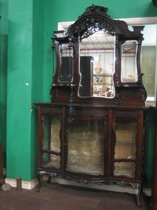 A Victorian mahogany chiffonier with raised multi-plate mirrored back, fitted 2 niches, the base fitted a bow front cupboard enclosed by a glazed panelled door and raised on cabriole supports 48"