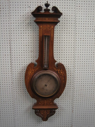 A Victorian aneroid barometer with silvered dial by Woods Abrahams of Liverpool, contained in an inlaid rosewood wheel case