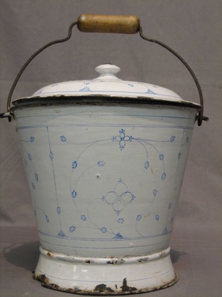 A French blue and white enamelled slop pail and cover