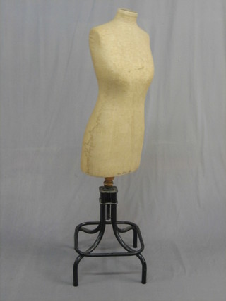 A tailor's mannequin marked 36b, 28w, 38h