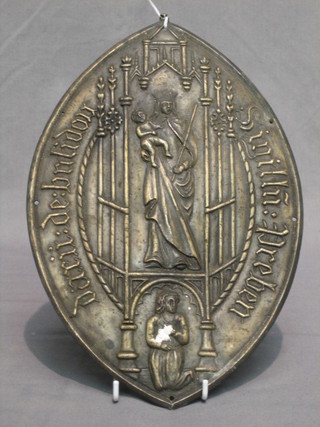 An embossed oval metal religious plaque 12"