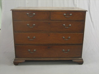 An 18th Century oak chest of 2 short and 3 long drawers, raised on bracket feet 43" 