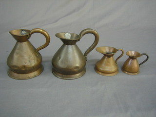 2 19th Century copper harvest measures pint and 1 pint, together with 2 later harvest measures 3" and 2 1/2"