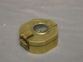 A reproduction Stanley brass compass