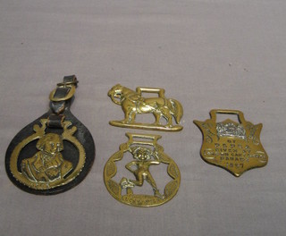 An RSPCA merrit badge horse brass 1897 and 3 other horse brasses