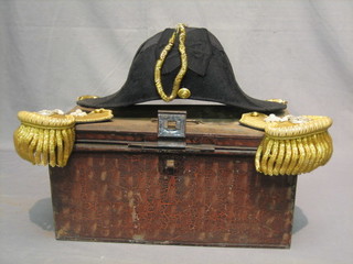 A pair of 19th/20th Century Royal Naval Officer's epaulettes complete with cocked hat, contained in a Japanned case