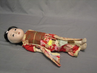 An Oriental "porcelain" doll