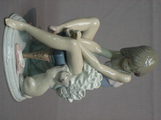A Lladro figure - seated Ballerina with cat 7"
