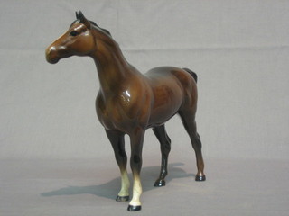 A Beswick figure of a standing chestnut horse 8"