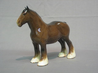 A Beswick style figure of a standing shire horse 8"